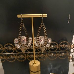 Costume jewelry triangle shaped earrings
